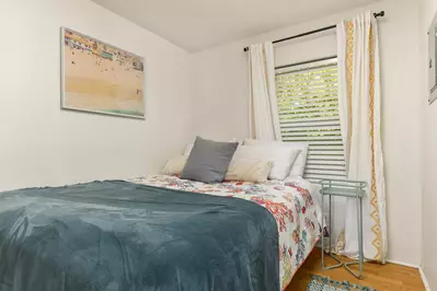 This motel unit has a full bed and a full sofa bed.