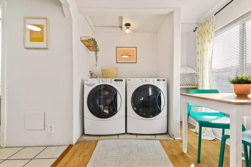This motel unit has an up to date washing machine and dryer for guest use.