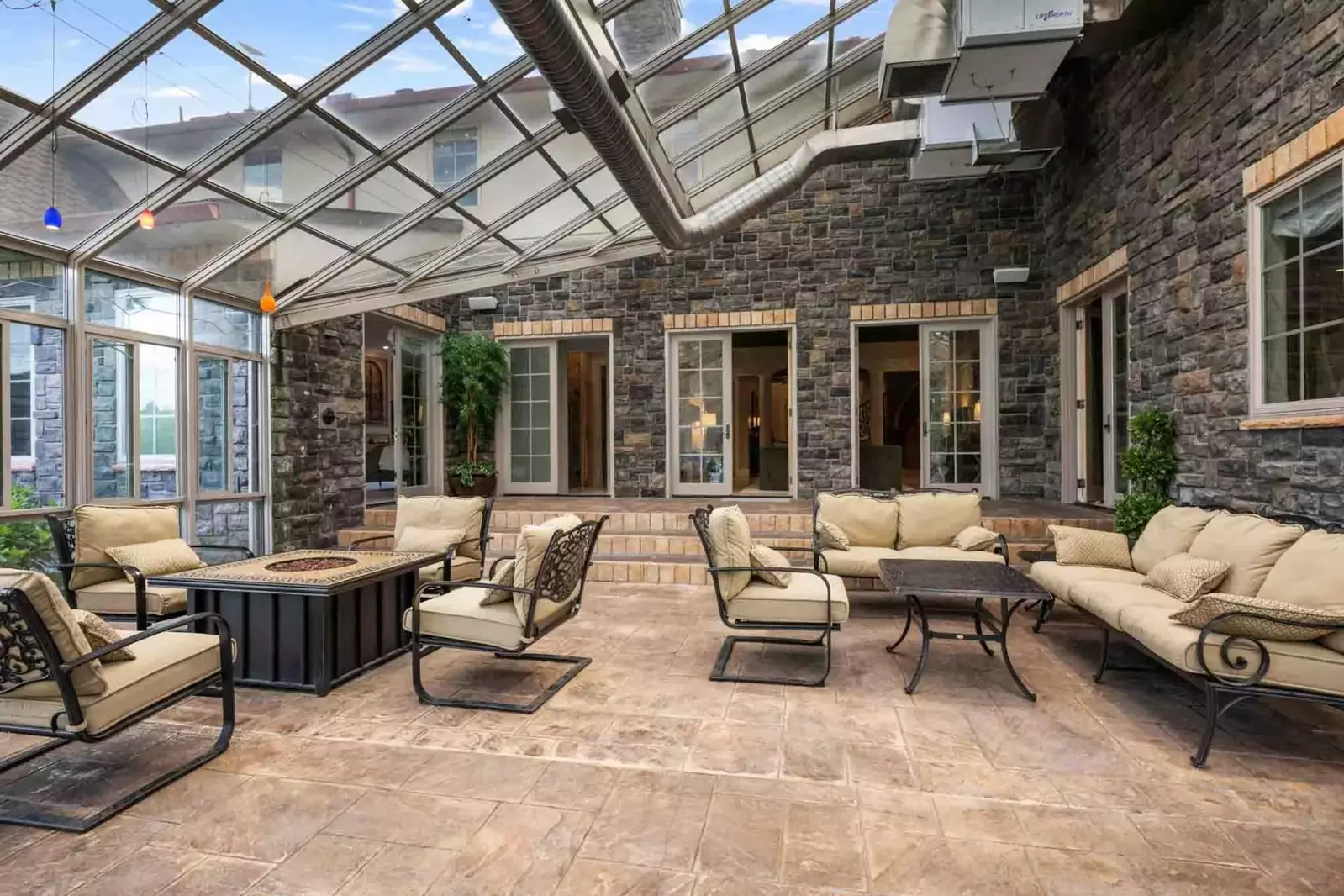 The massive windows and glass ceiling allow guests to enjoy lovely views yearound.