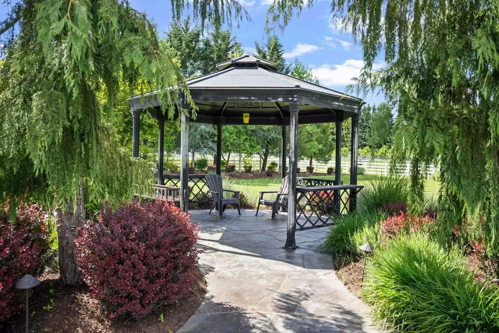 The gazebo is an excellent place to bask in the beauty of this property.
