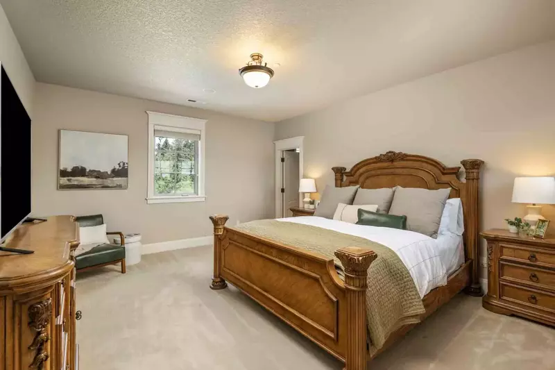 Another comfortable bed with a smart tv.