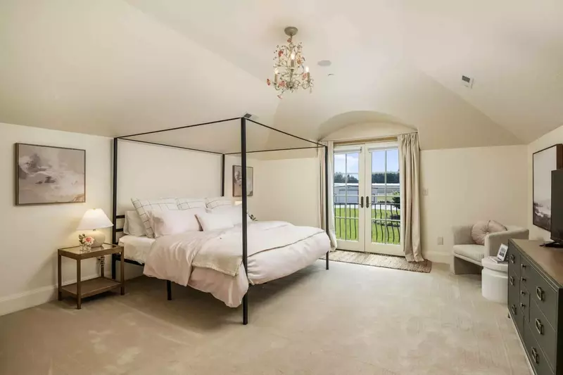 This room has another comfy bed with a smart tv and a great view.