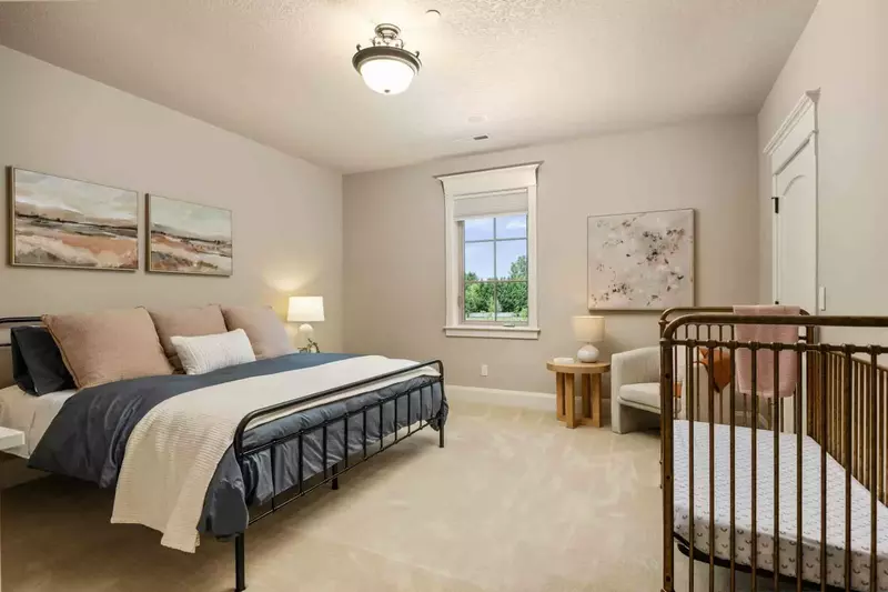 This room has an excellently crafted crib for the youngest guests.