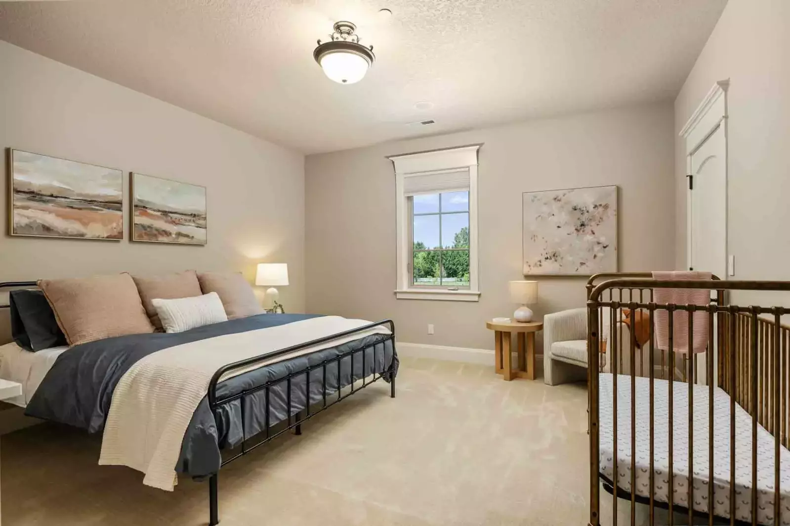 This room has an excellently crafted crib for the youngest guests.