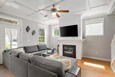 Relax in the living room in front of a cozy fire, while watching your favorite shows, movies, and sports!