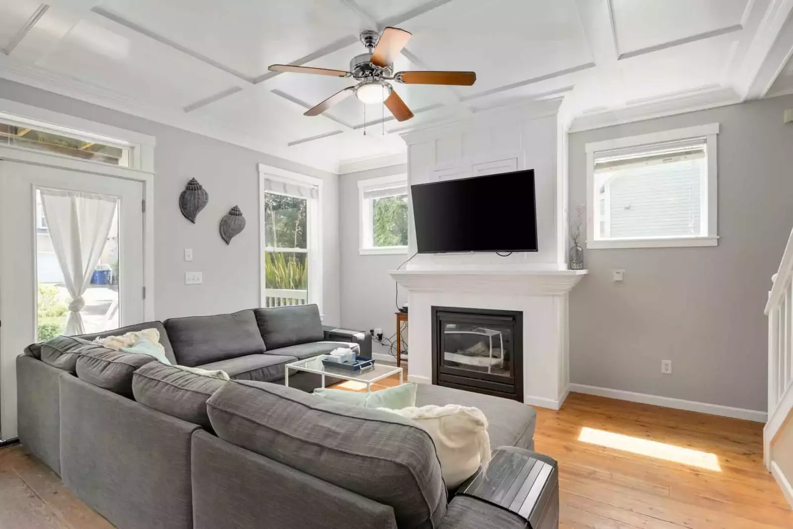 Relax in the living room in front of a cozy fire, while watching your favorite shows, movies, and sports!