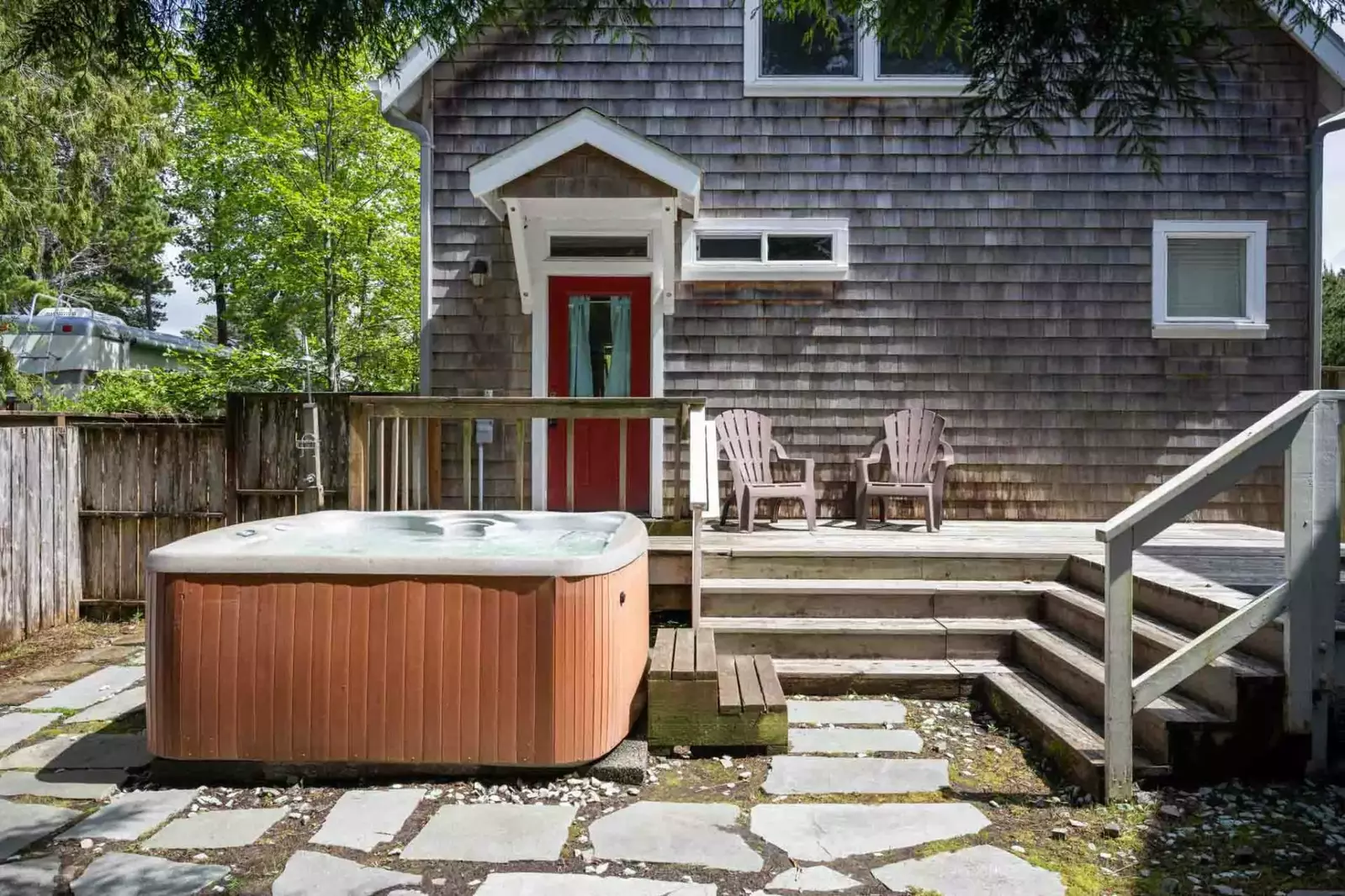 Enjoy a soak in the hot tub after a lovely day exploring the coast.