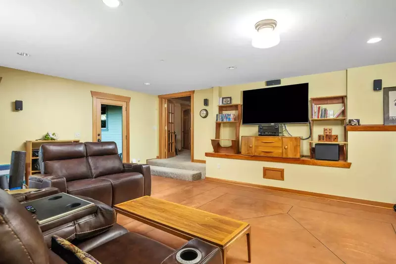 Watch you favorite movies, shows, and sports on this smart tv while relaxing in this cozy living room