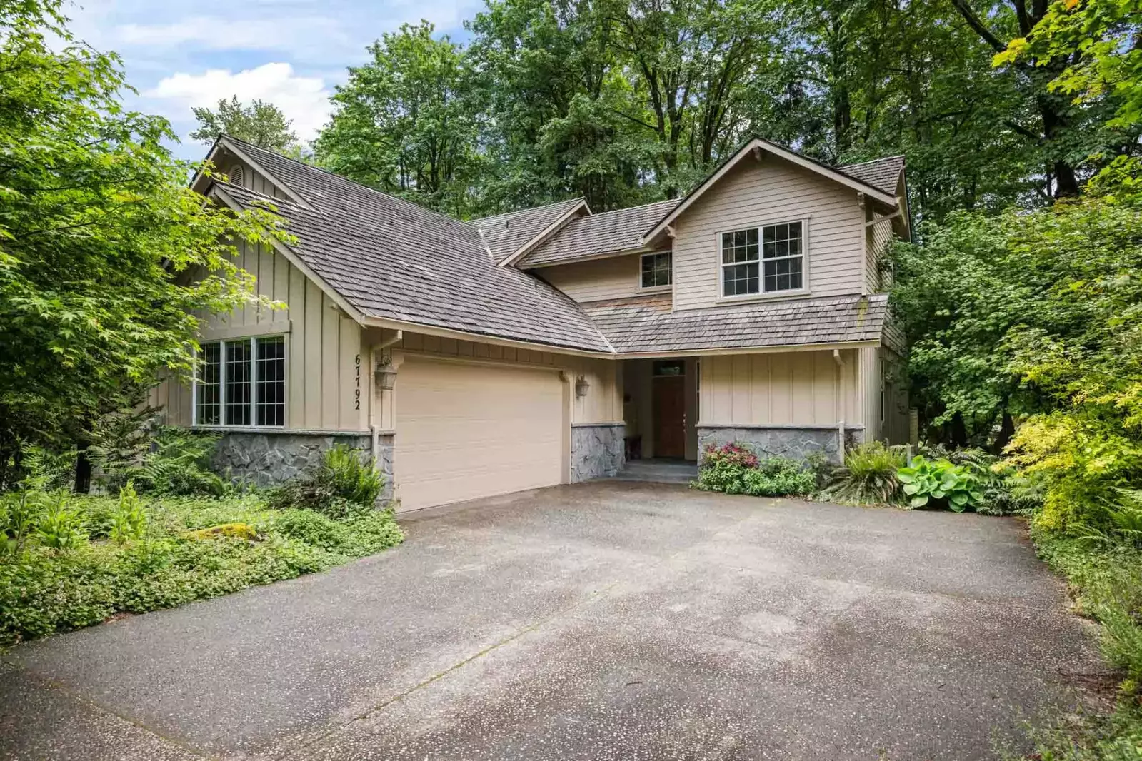 The driveway and road are plowed during winter.