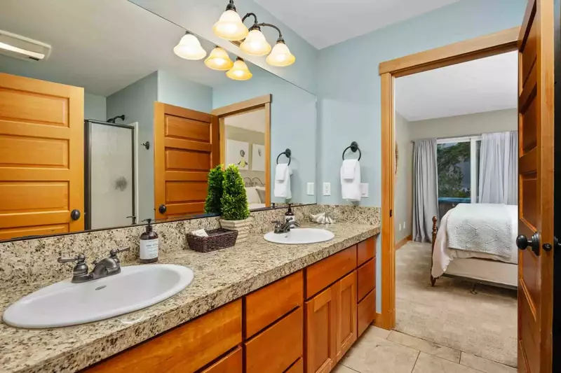 This bedroom features an en suite bathroom.