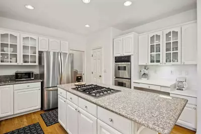 The kitchen has excellent supplies and bountiful counter space.
