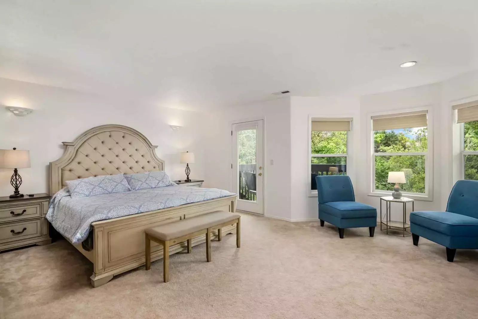 This bedroom is incredibly spacious, with a comfy bed and excellent design.