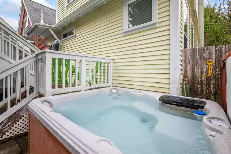 The hot tub is a favorite amenity perfect during warm summers and enchanting winters.