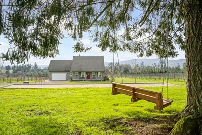 Relax in the country air while sitting on the swing.