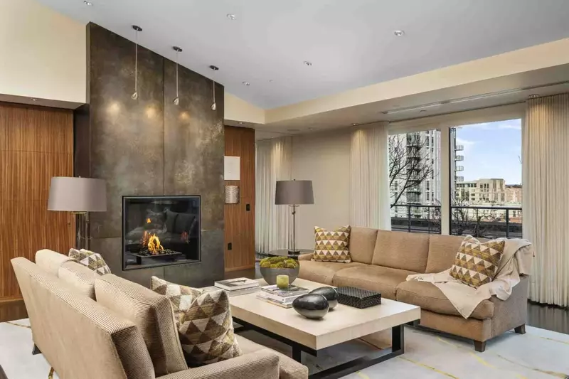 Relax and read a book in the living room while basking in the warmth of the fireplace.