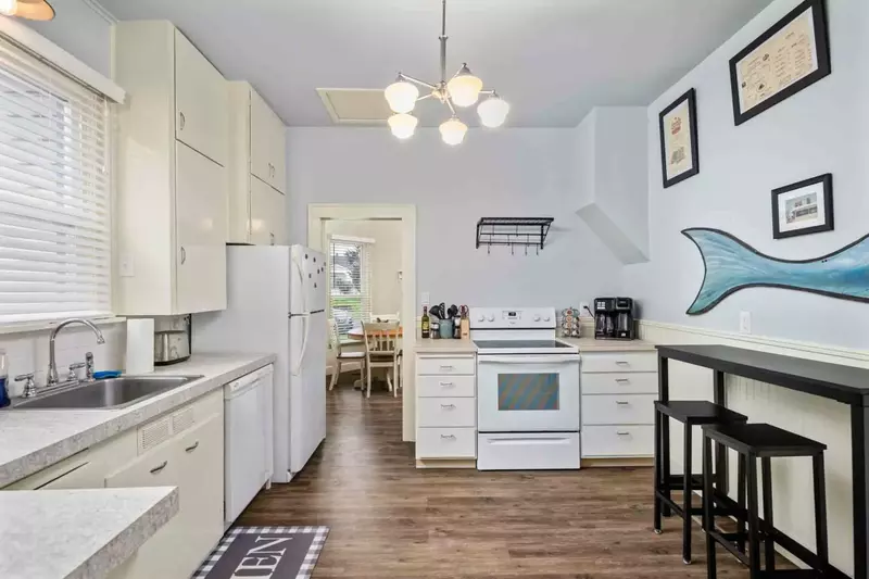 The kitchen is spacious and efficient. Perfect place to prepare a family meal.