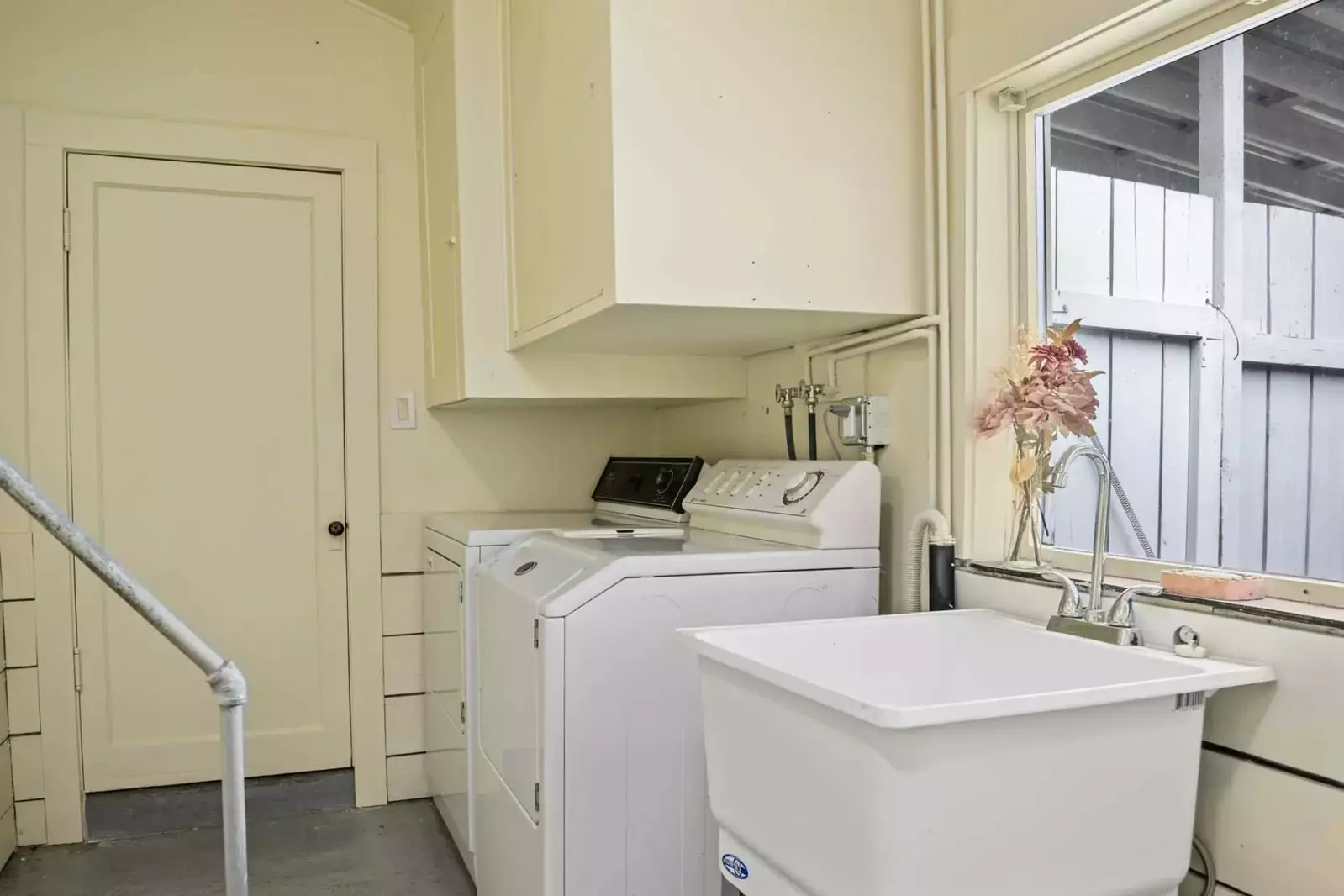 Washing machine and clothes dryer in the rental.