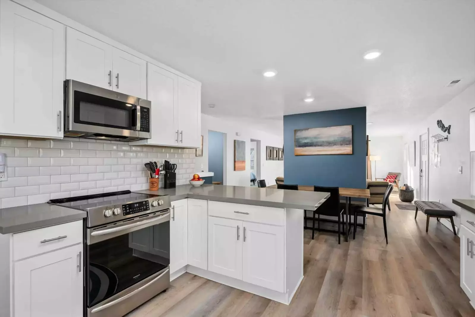 The kitchen at this rental is well stocked with up to date amenities and has ample counter space.