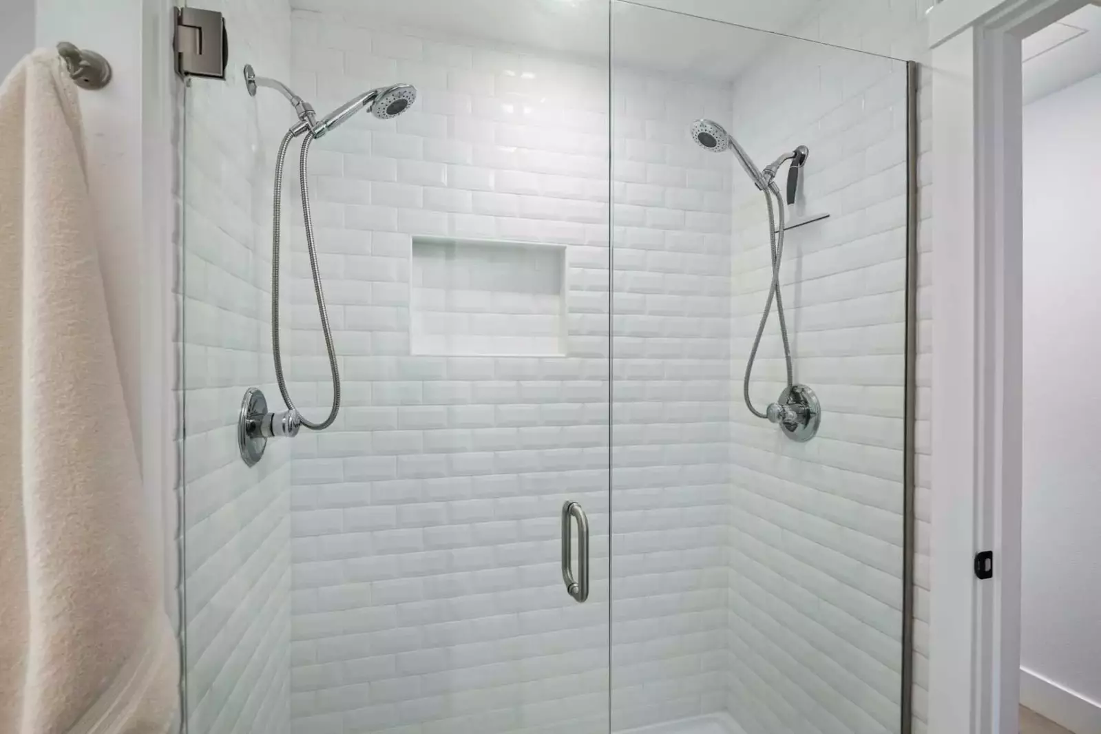 The shower is spacious, up to date, and has excellent water pressure.