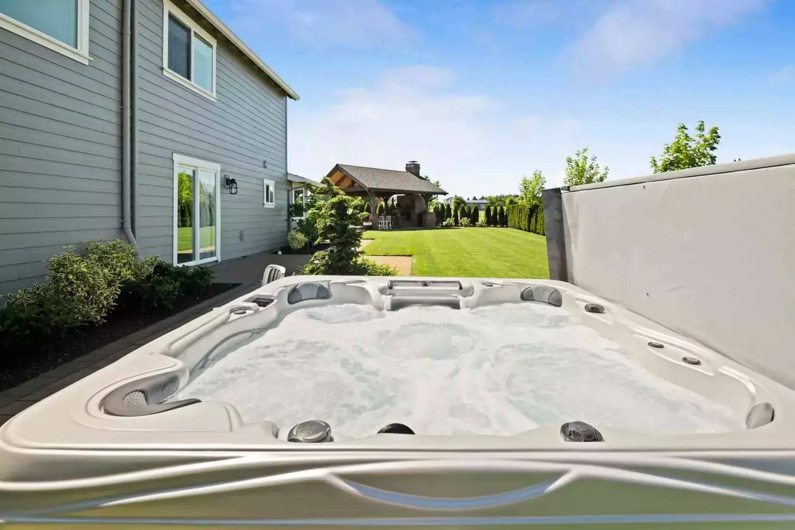 The hot tub is a favorite amenity perfect during warm summers and enchanting winters.