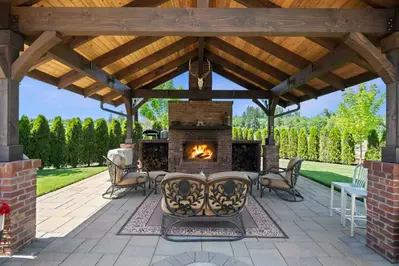 The outdoor fireplace is an excellent place to relax after a day of exploring Oregon!