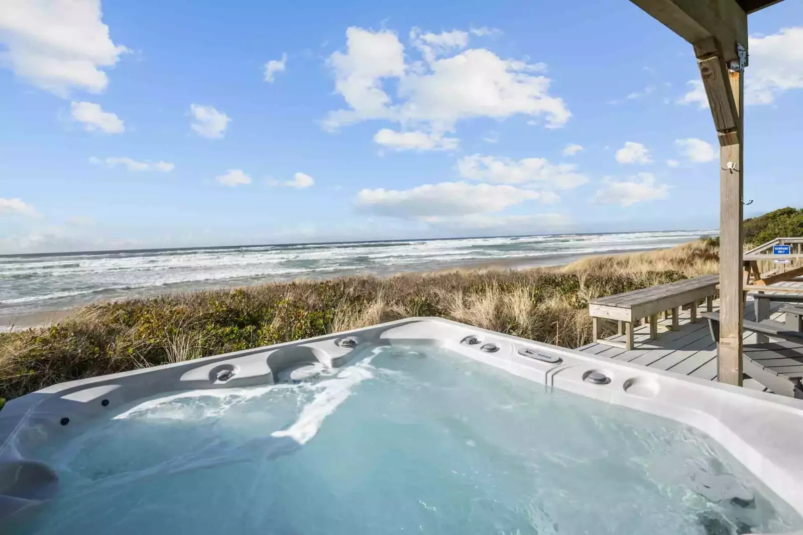 The hot tub is a favorite amenity perfect during warm summers and enchanting winters.  It has a great view of the ocean.