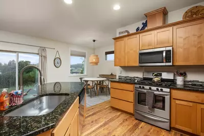 The kitchen is spacious and efficient. Perfect place to prepare a family meal.
