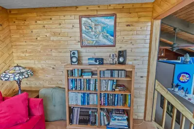 Enjoy plenty of entertainment from this rental's library.