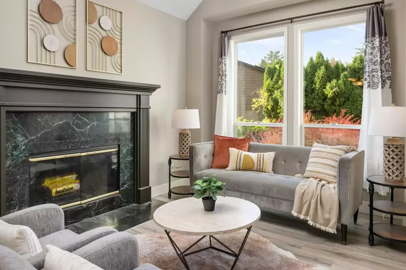 Relax in the living room in front of a cozy fire.