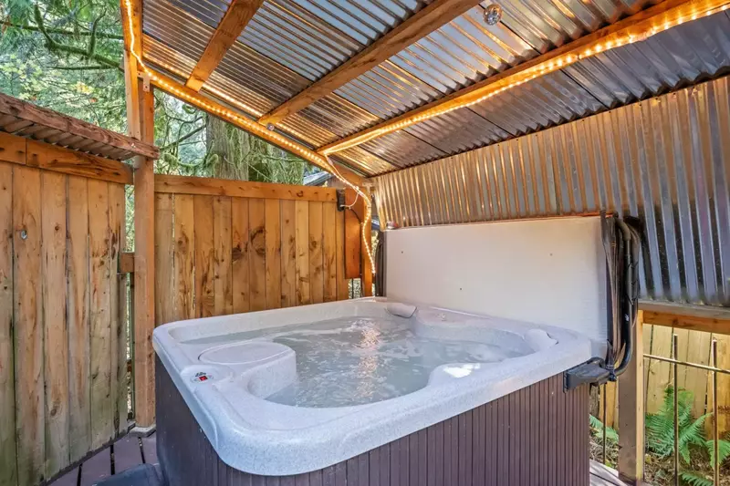 The hot tub is a favorite amenity perfect during warm summers and chilly winters.