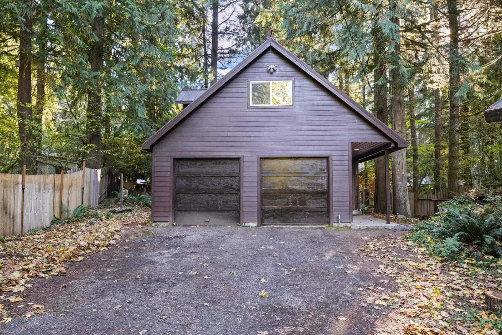 The driveway and road are plowed during winter.