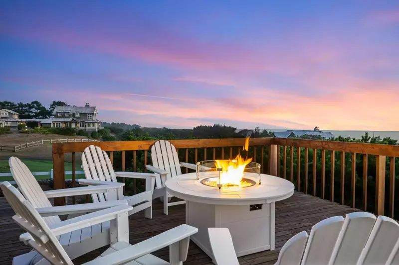 Enjoy the views and fresh ocean air while relaxing around the fire table.