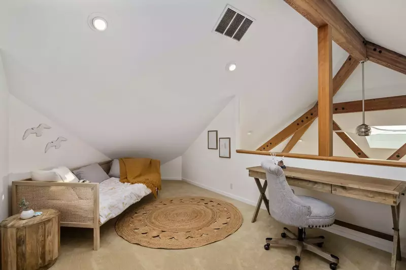The loft room is charming and relaxing. It also serves as a home office.