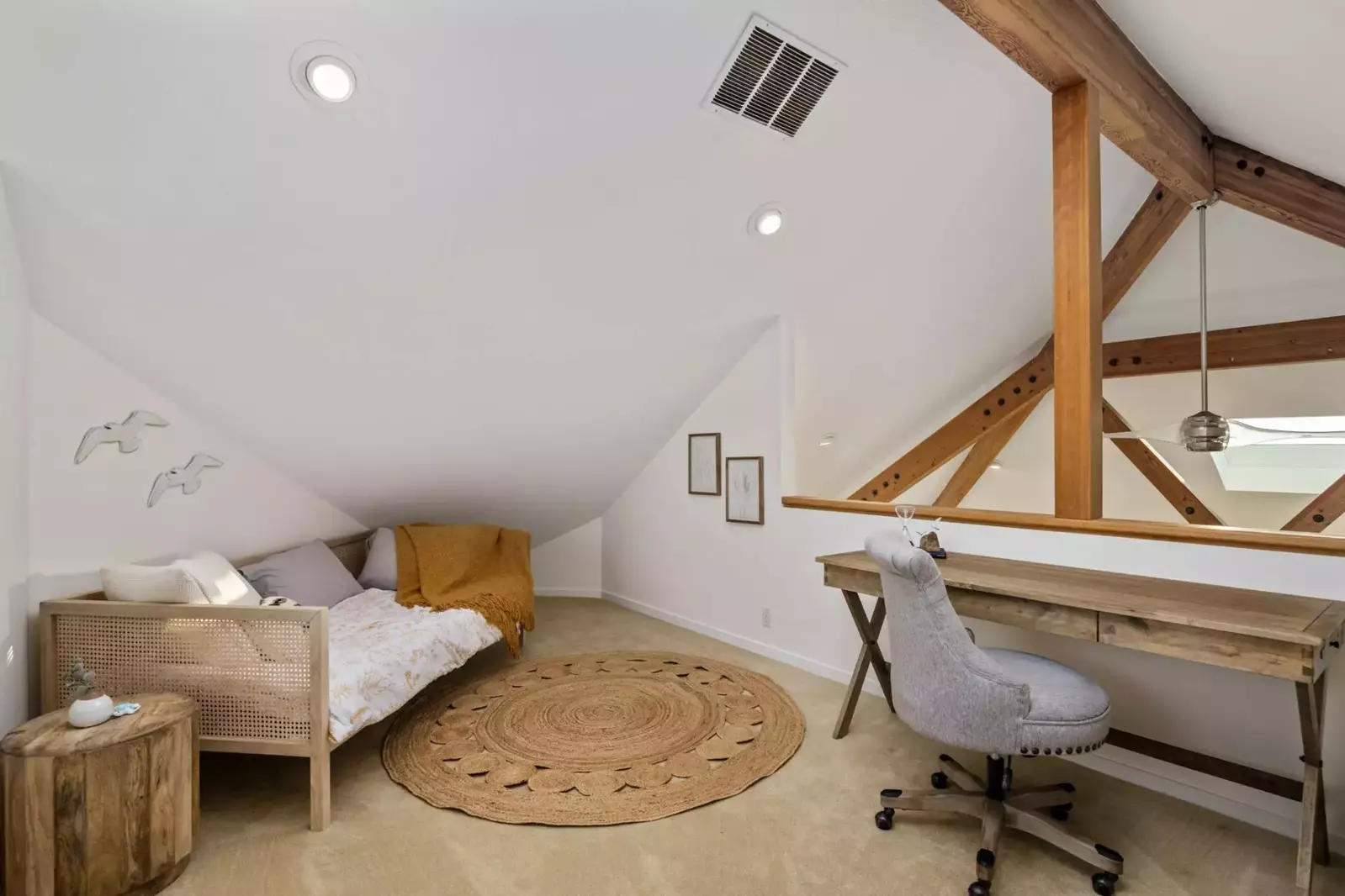 The loft room is charming and relaxing. It also serves as a home office.