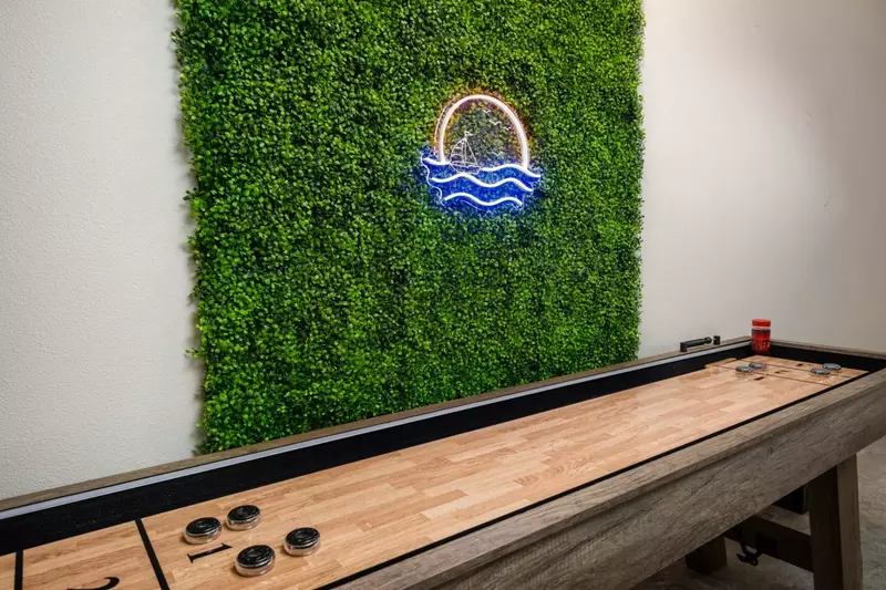 "Beautiful setting and home, with a very well-equipped kitchen, window filled great room, luxurious bathrooms, and fun games in the garage" - Maxine