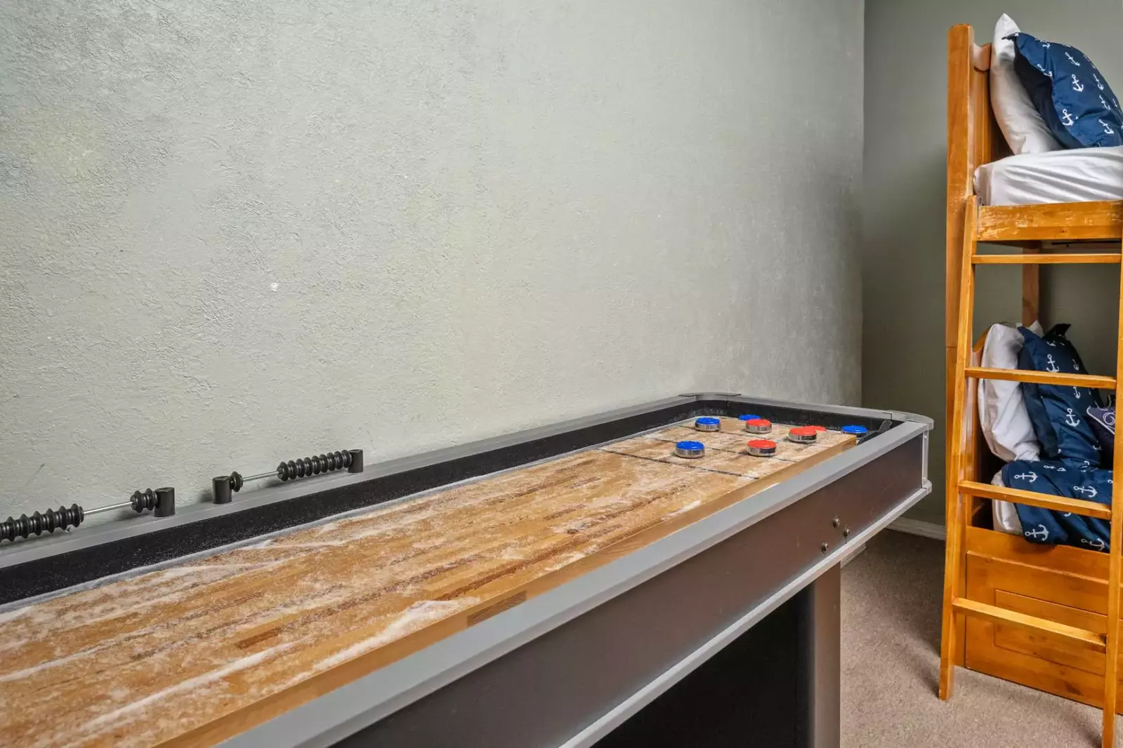 This rental also has a shuffleboard table in the bunk room.