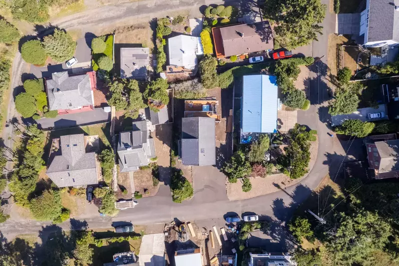 Located in a quiet residential neighborhood on the north side of town, this home is a quick five-minute walk to easy beach access.