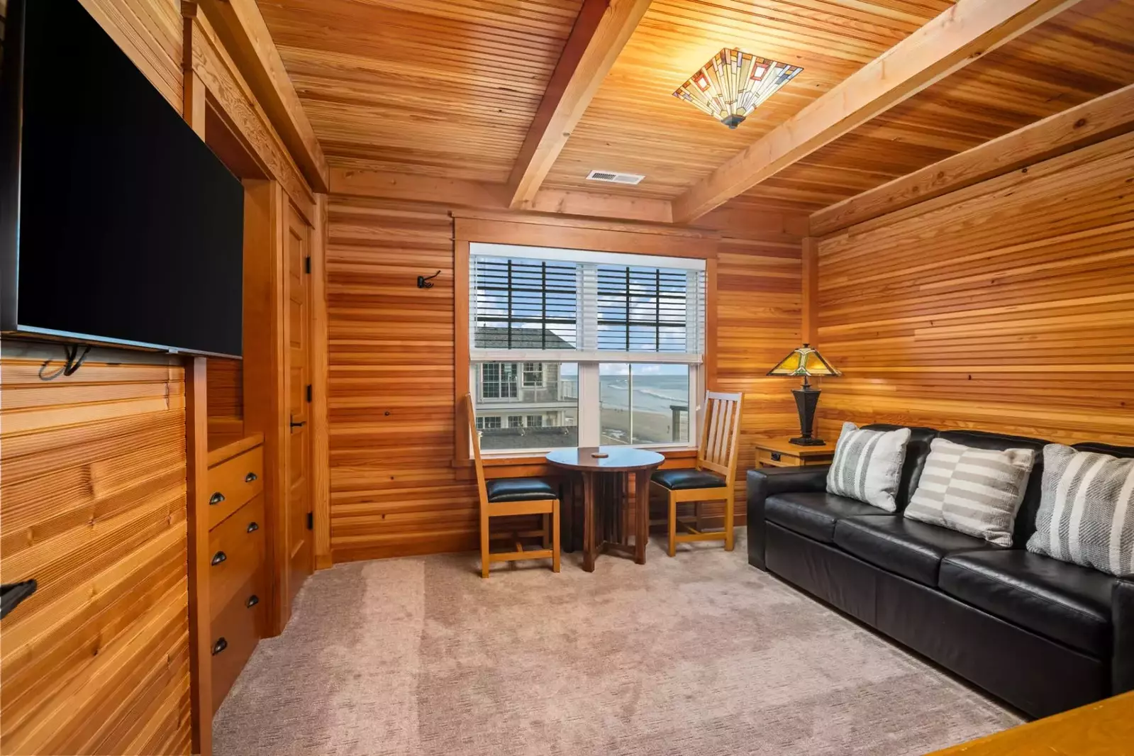 Host a movie night in this room after a day on the beach!