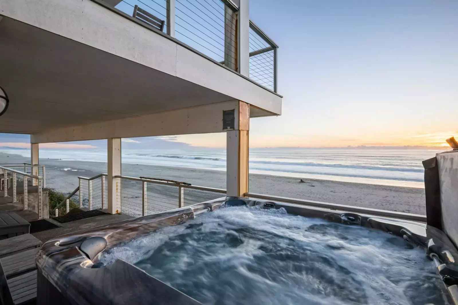 Imagine relaxing in the hot tub while watching a breathtaking Oregon Coast sunset.
