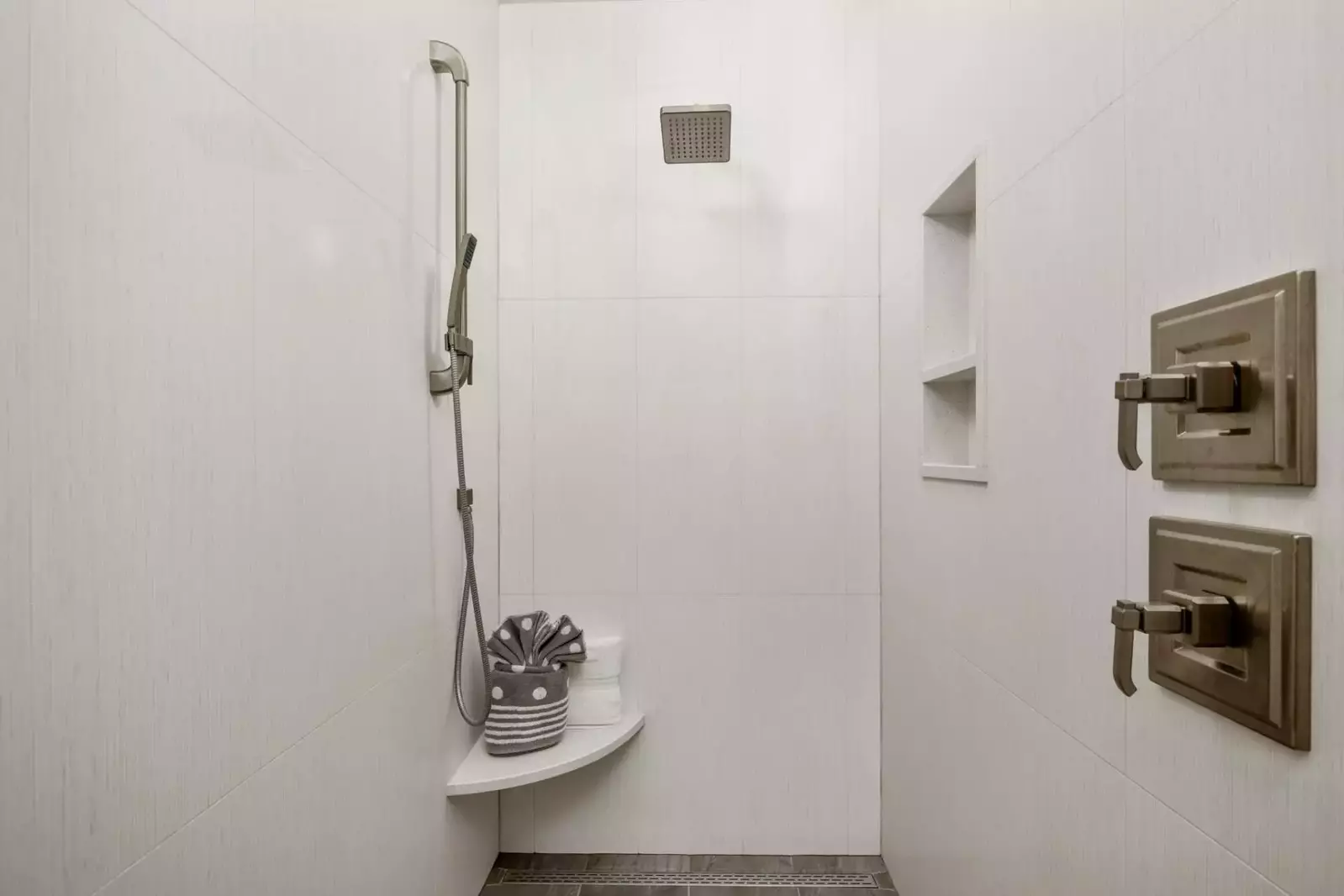 This shower is large, up to date, and has excellent water pressure.