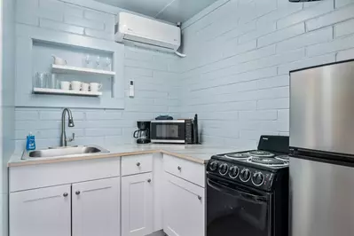 "Having the full kitchen saved quite a bit of money and it’s nice to be able to cook and store food in the fridge" - Julia