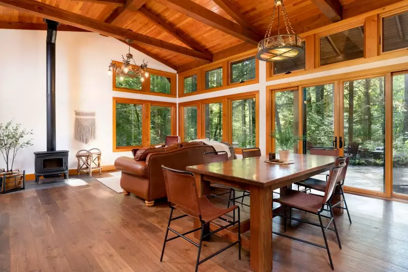 Very quiet and private with a simple, modern open feel that is highlighted by banks of widows looking out at a mix of hemlock, cedar & vine maple -Jon