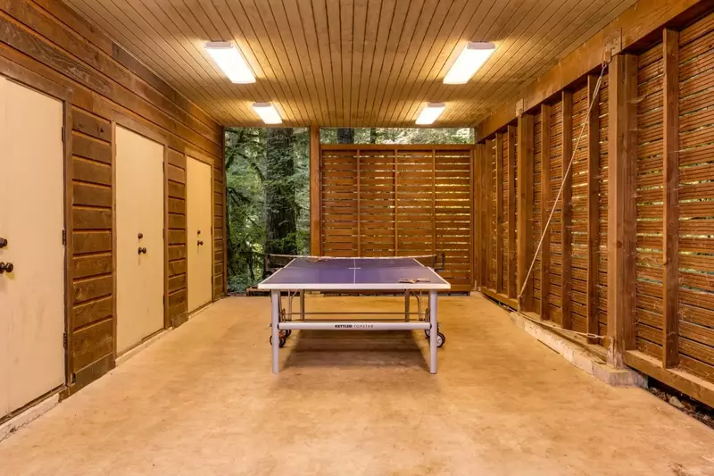 The ping pong table is outside be protected from the elements.