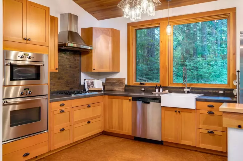 "Inside was very comfortable with great views of the forest and the creek. Kitchen was great.  Loved our stay and will definitely return." - Chris