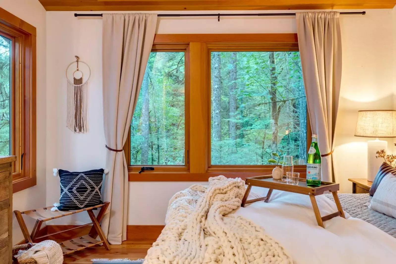 Enjoy breakfast in bed while looking at the beautiful forest views.