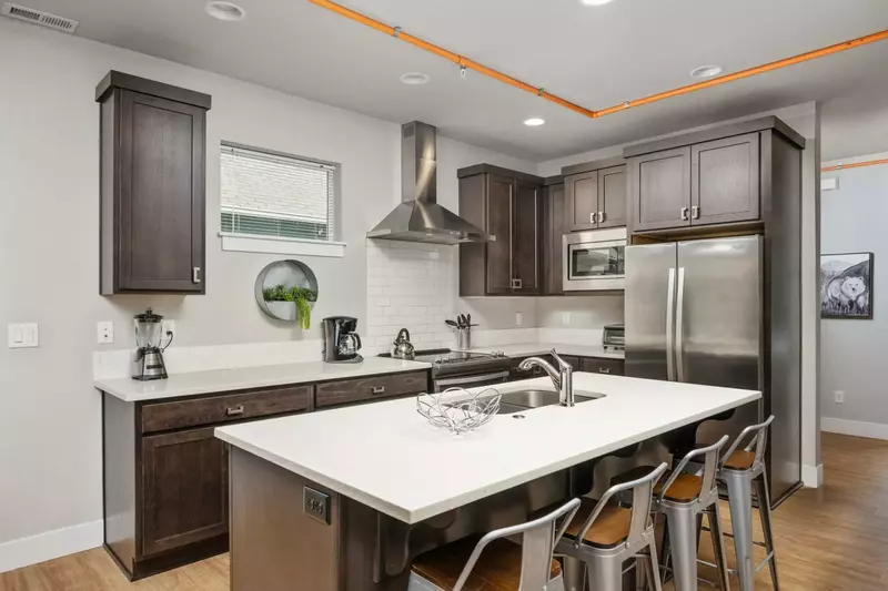 The kitchen is spacious and efficient. Perfect place to prepare a family meal.