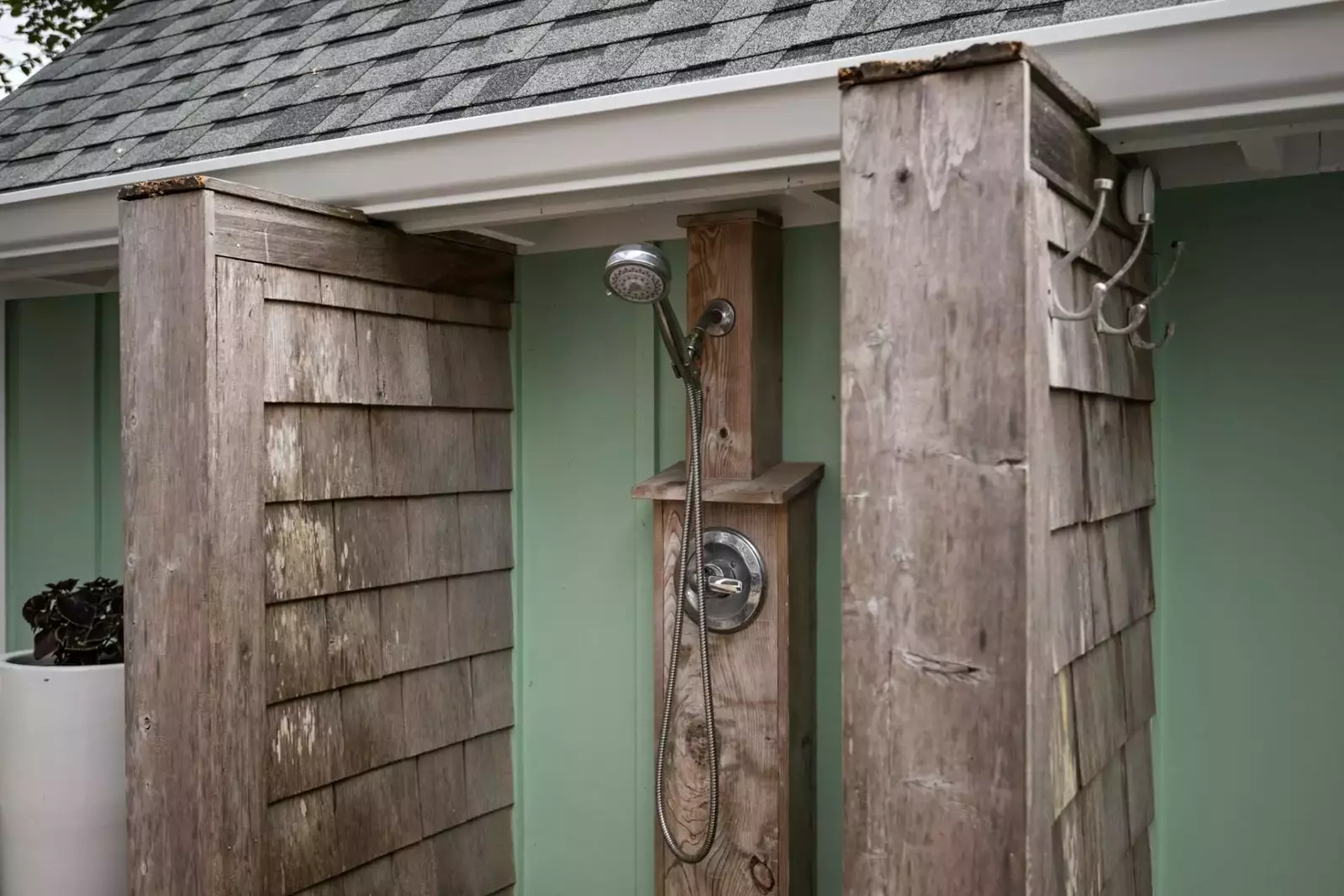 An outdoor shower to wash off in after a fun day on the beach.