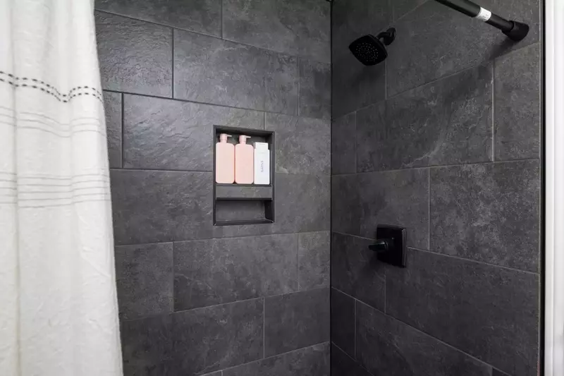 This shower is large, up to date, and has excellent water pressure.