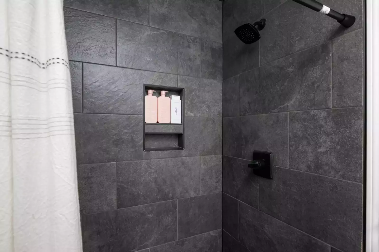 This shower is large, up to date, and has excellent water pressure.