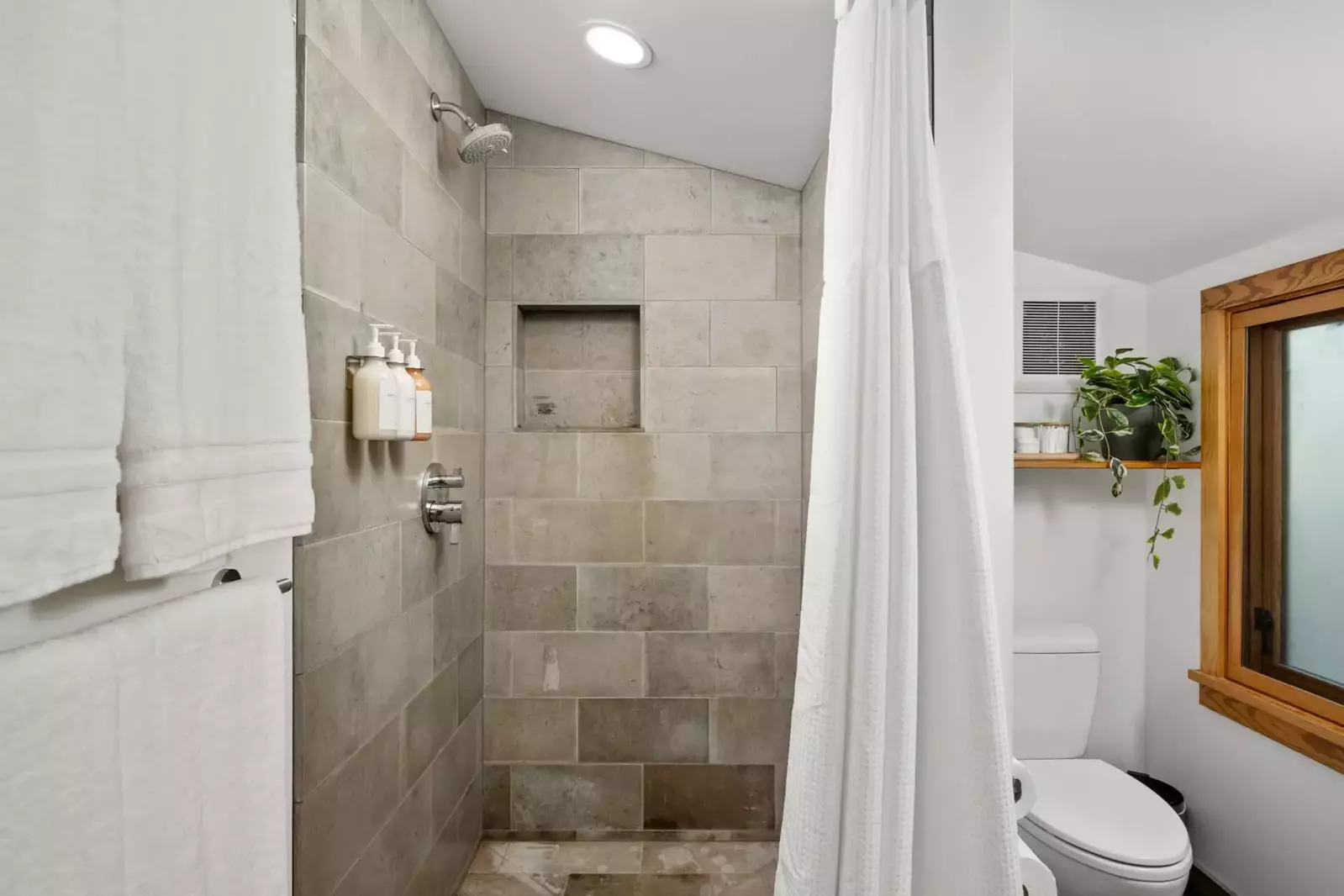 "The views are stunning. The kitchen has everything you need. The bathroom is roomy and the open space is lovely and full of light." - Anne